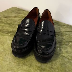 Women’s Reformation black loafers. Size 8